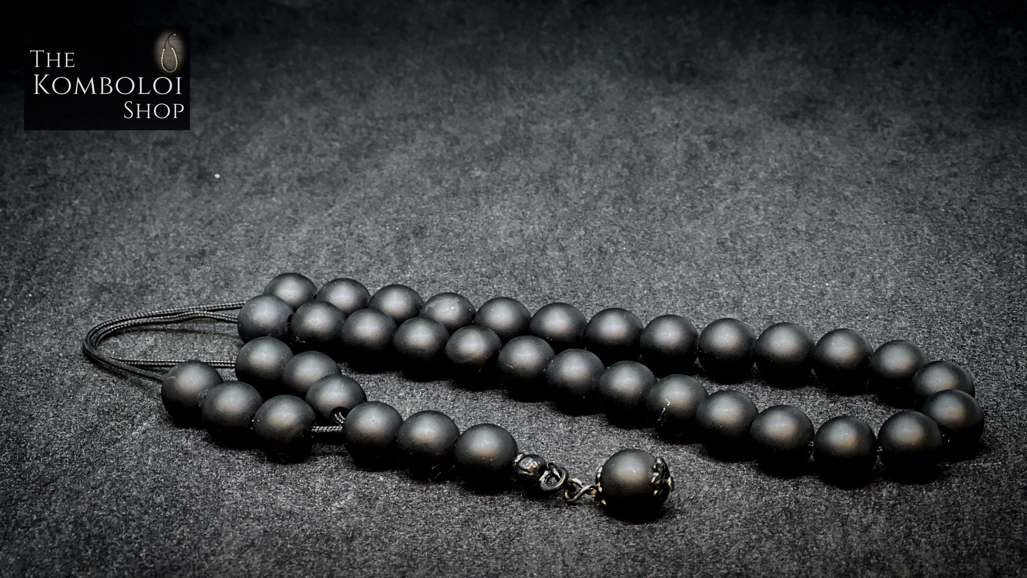 Black Onyx komboloi with 33+1 round faceted shade beads of orders 10mm diameter.